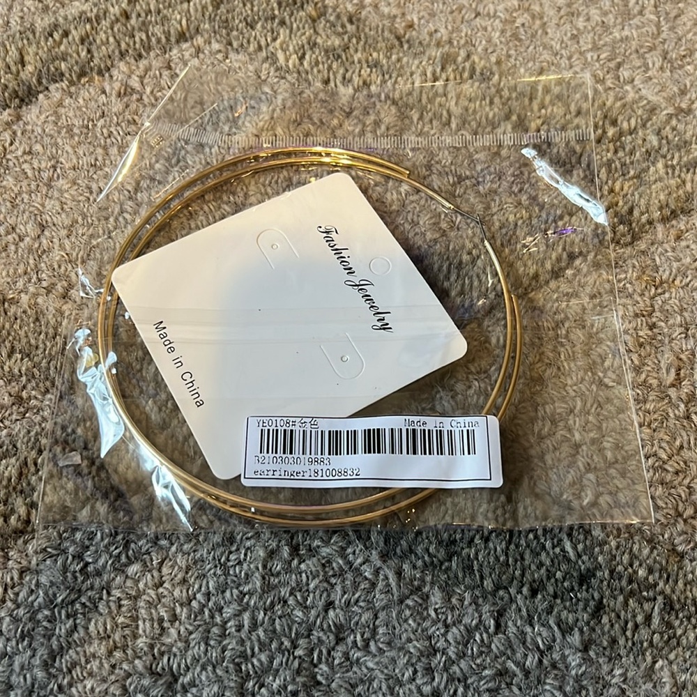 Large hoop gold earrings